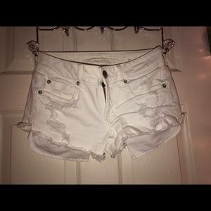 ripped American eagle shorts